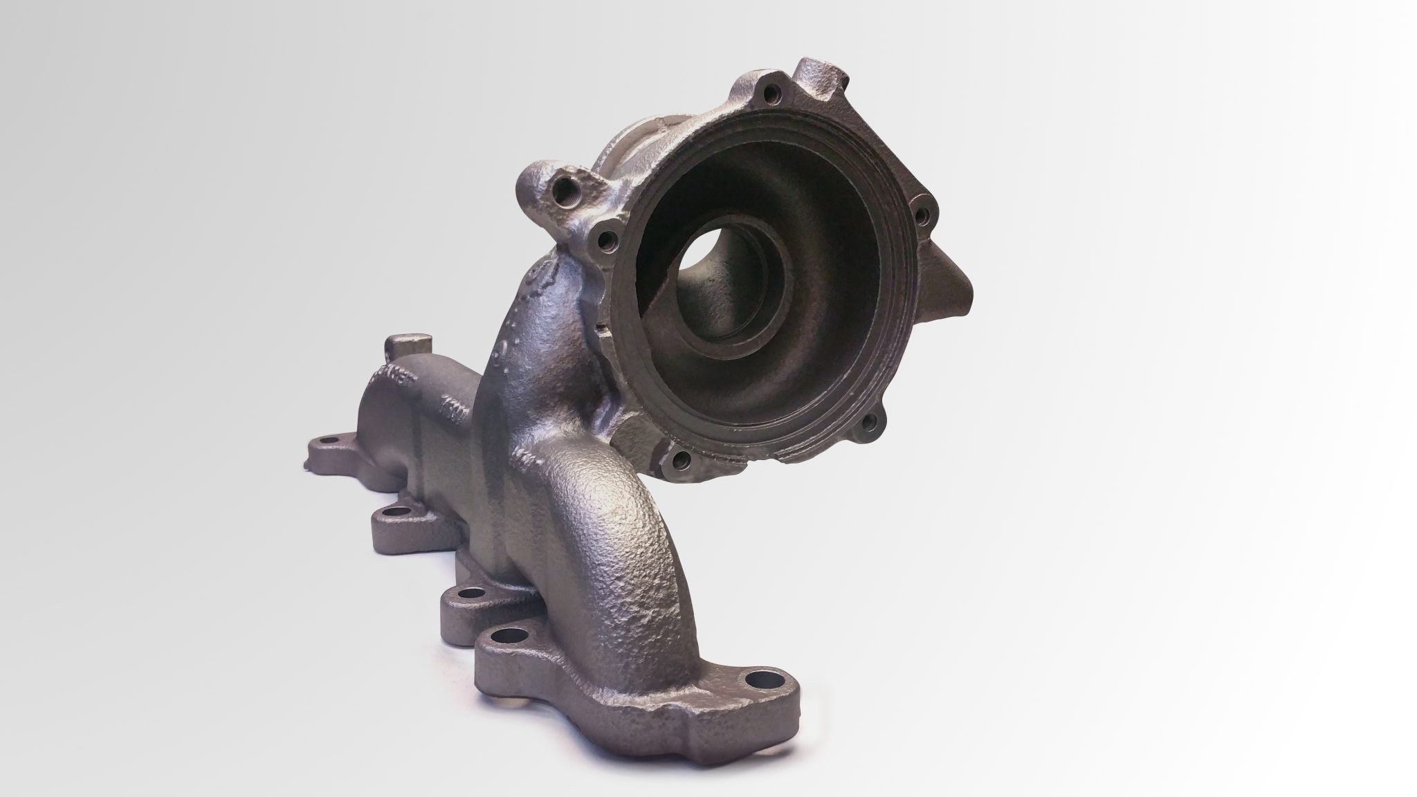 This is an image of a an exhaust manifold after sand-blasting process.